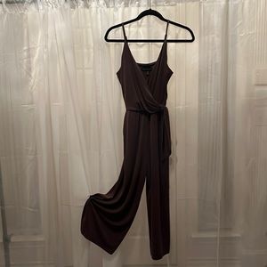 Brown jumpsuit.  Spaghetti straps and wide legs.